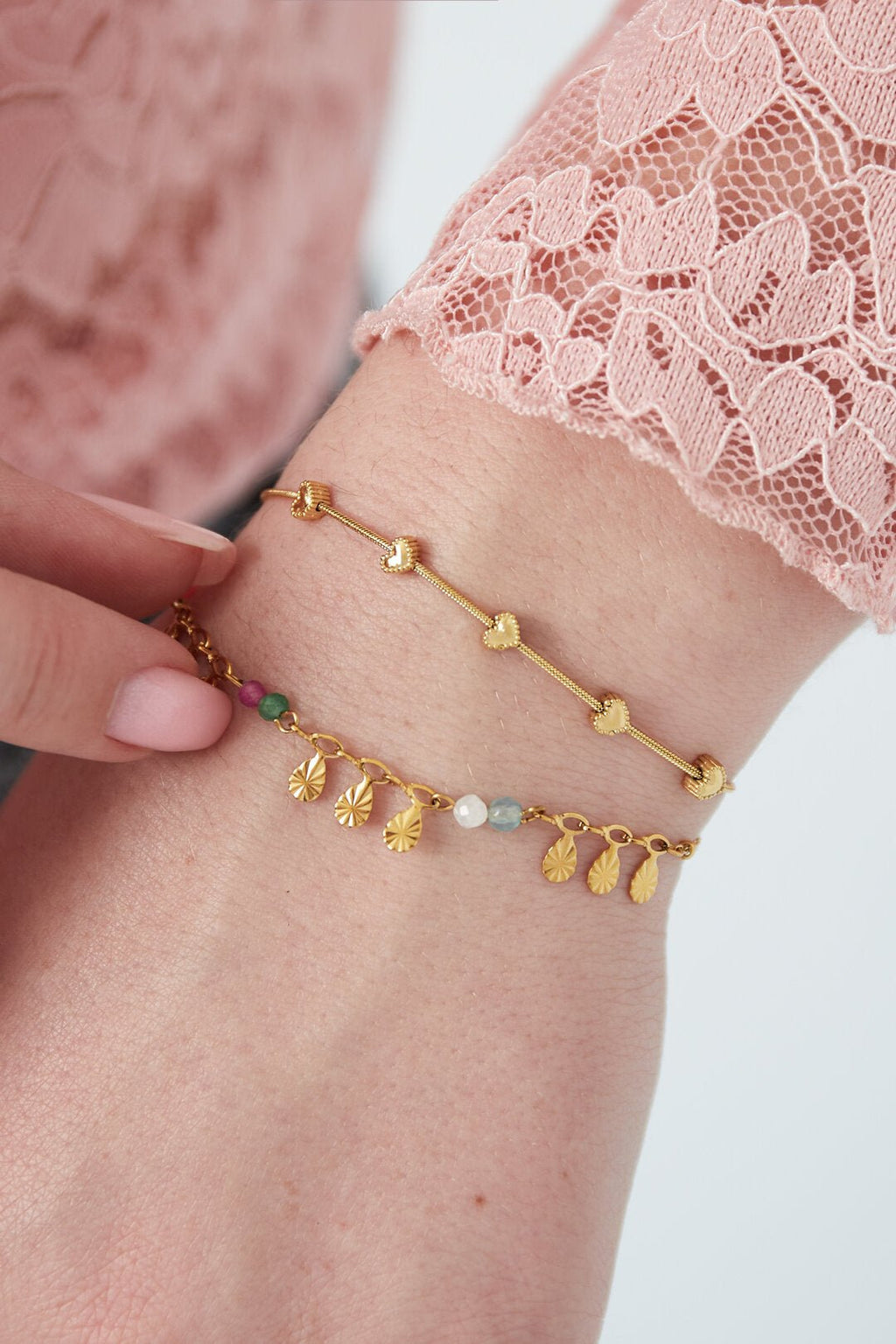 Charmante armband met hartjes, zilverkleurig