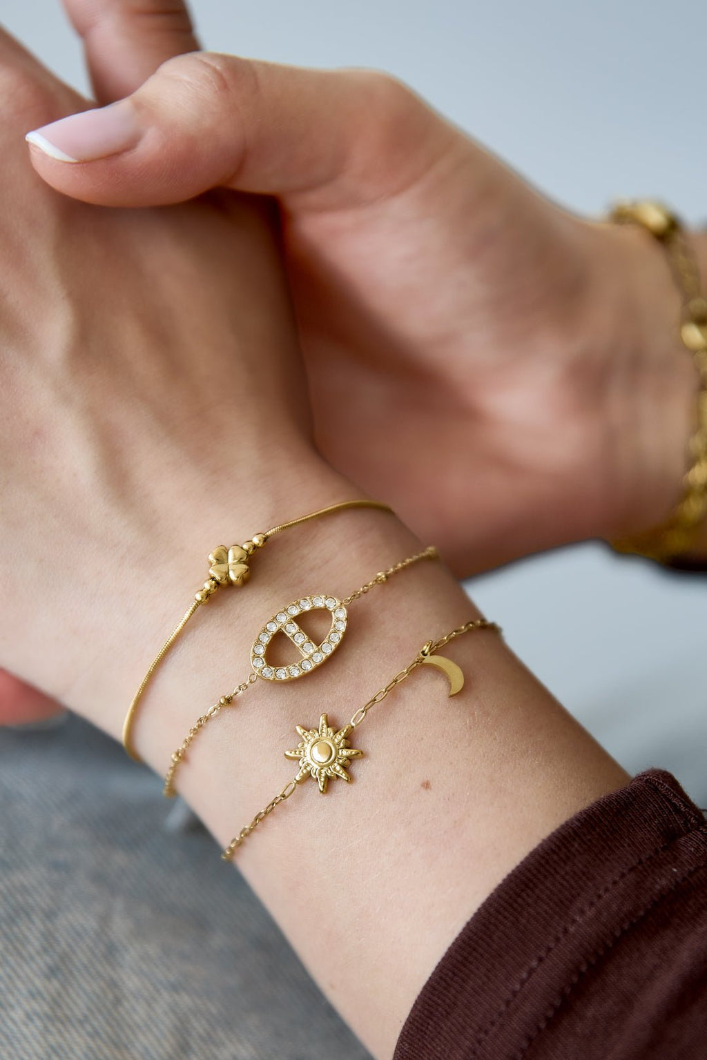 Armband met maan- en sterbedeltje, zilverkleurig