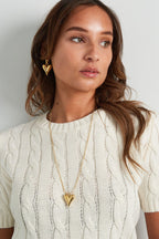 Bolletjes ketting met een groot hartje - Jewellery Fever