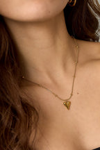 Bolletjes ketting met een klein hartje - Jewellery Fever