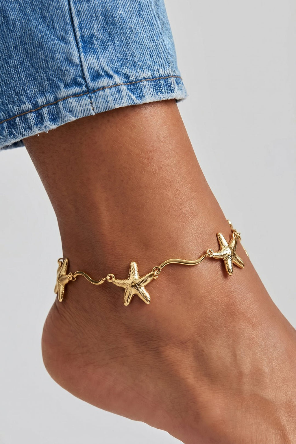 Elegante enkelband met zeester - Jewellery Fever