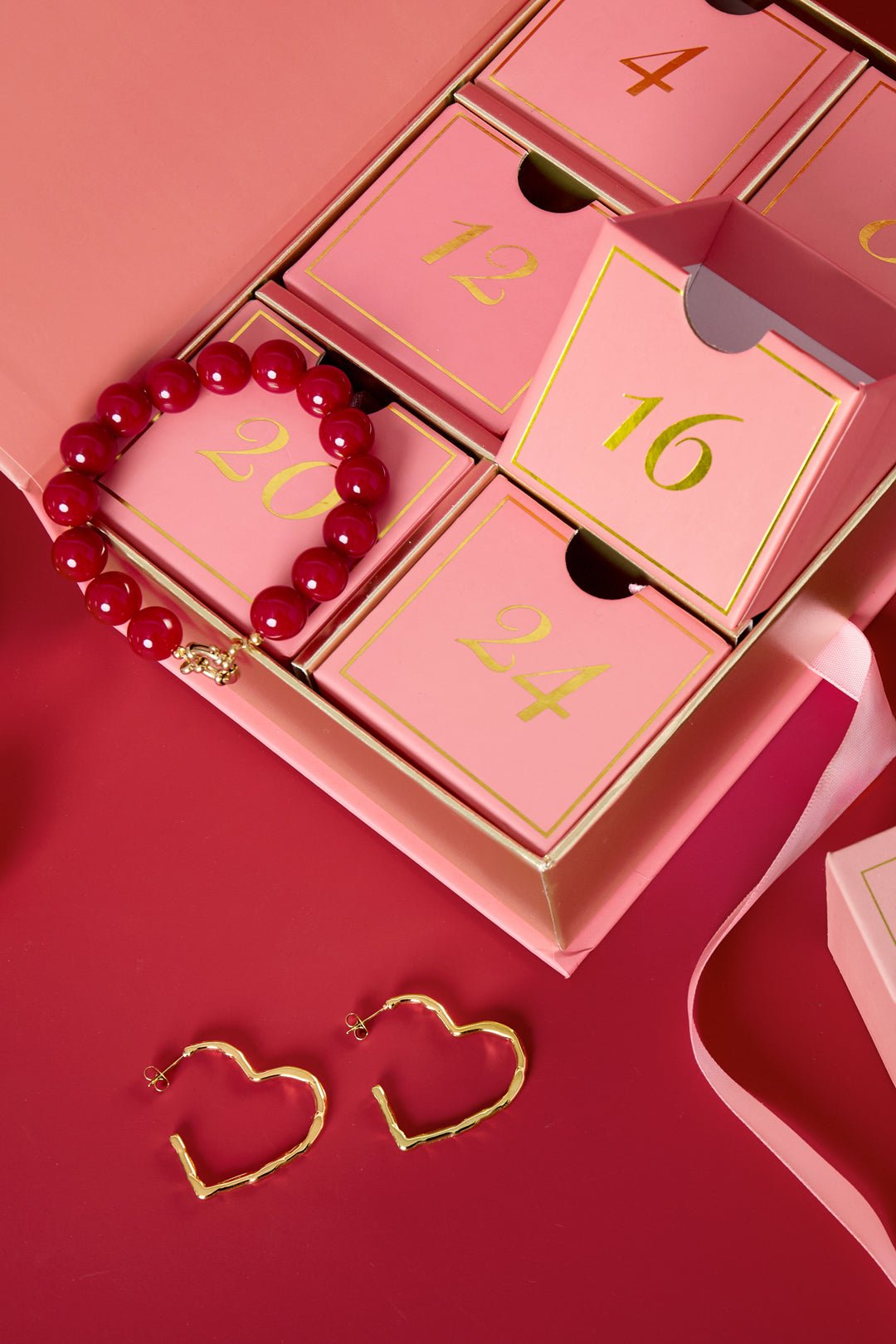 Roze adventskalender met 6 sieraden & accessoires - Jewellery Fever