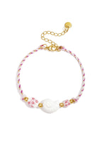 Speelse schelparmband met kralen in drie kleuren - Jewellery Fever